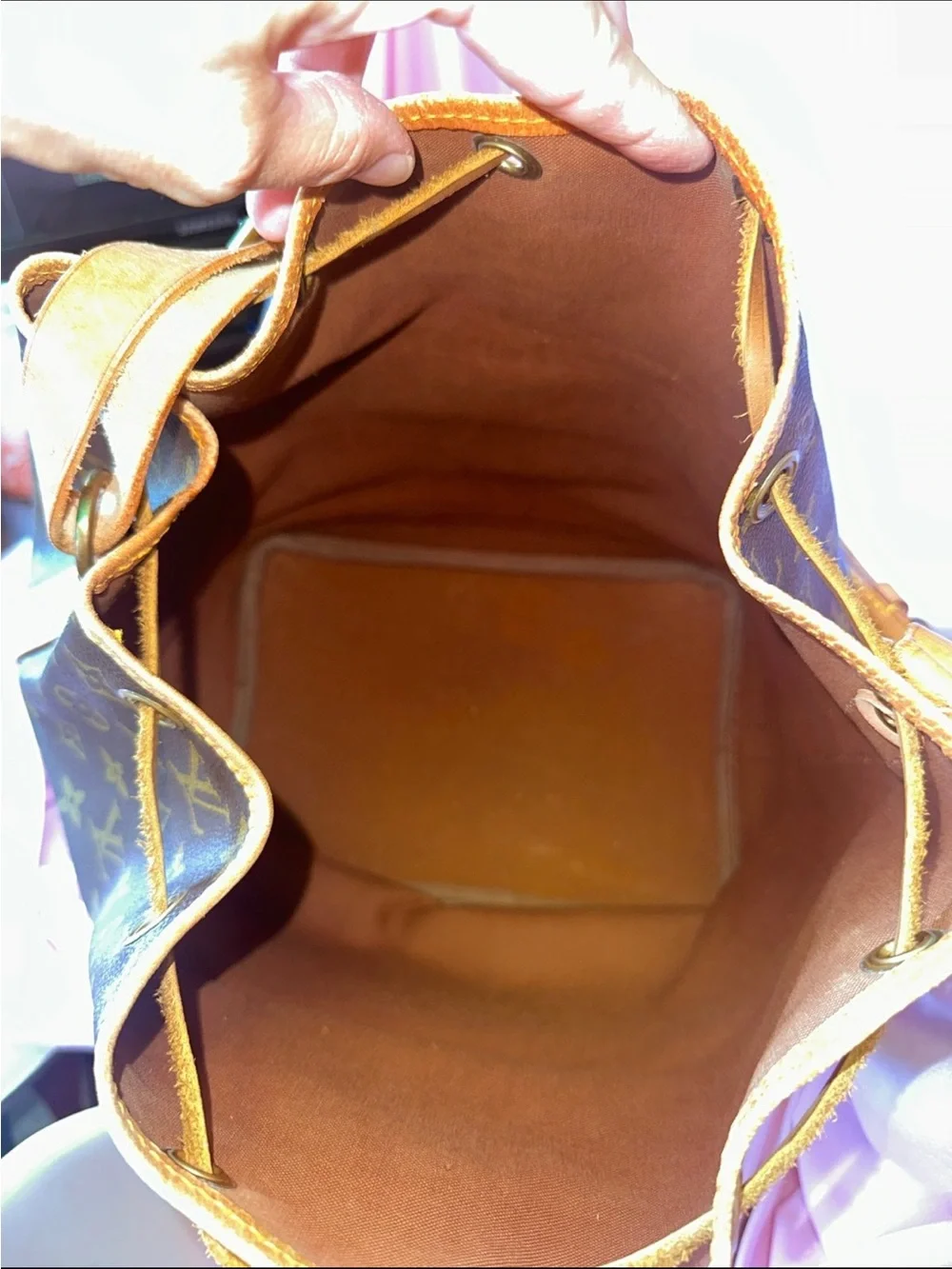 Louis Vuitton Monogram Drawstring Hobo Bag in Brown and Tan